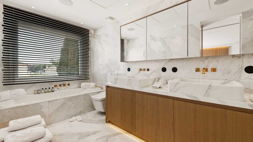 Luxurious bathroom with marble countertops and elegant decor